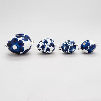 Gunvor Olin-Grönqvist, a set of four porcelain eggs, signed Ateljé GOG / IP Arabia, Finland.