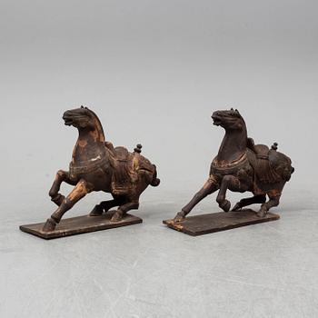 Two large wooden sculptures of horses, 20th century.