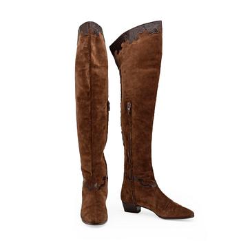 DALCO', a pair of brown suede boots.