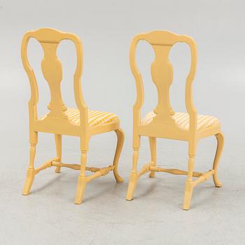 A 13-piece Rococo style dining room furniture suite, 20th Century.