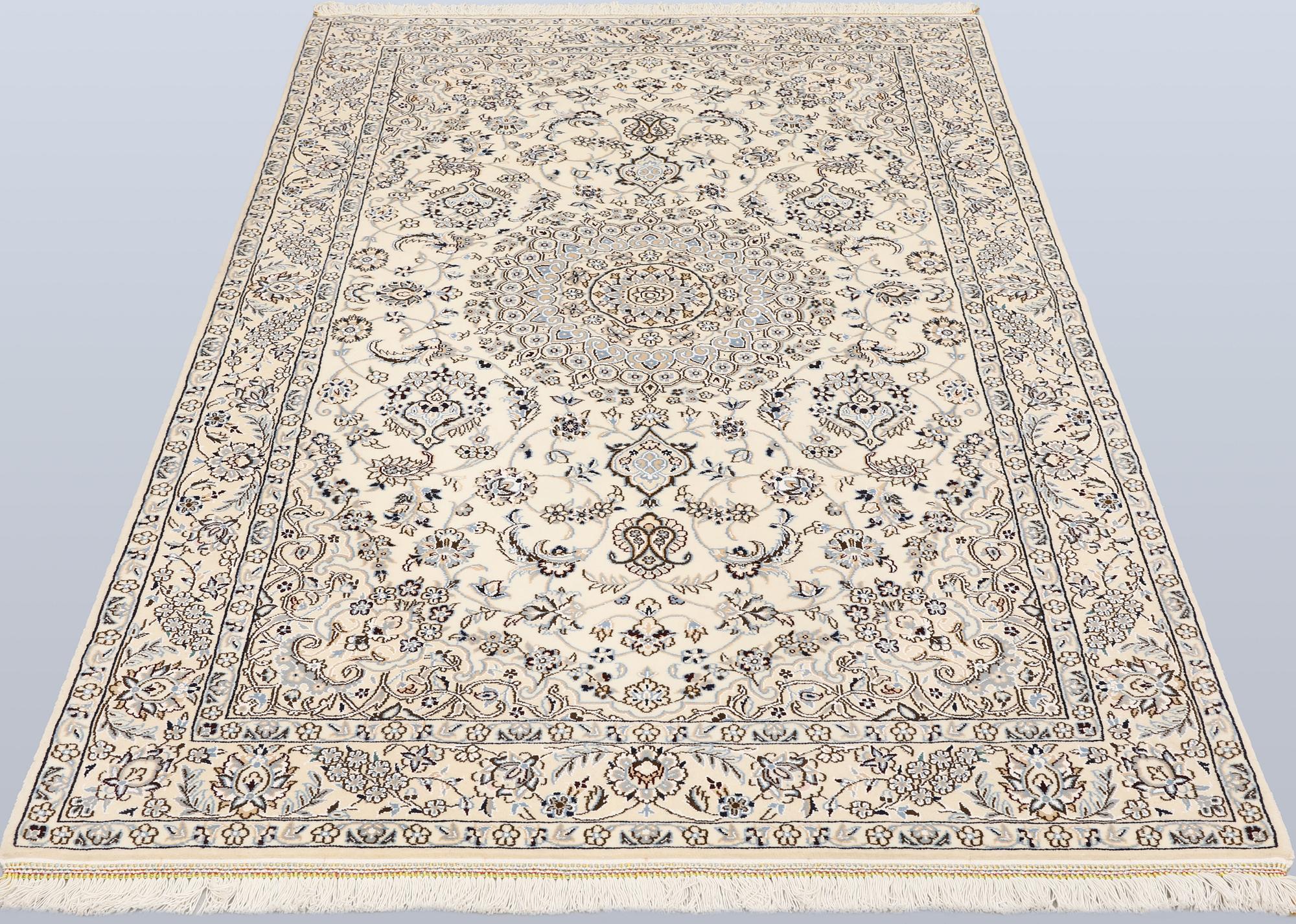 A Nain rug, part silk, so-called 9LAA, c. 210 x 130 cm.