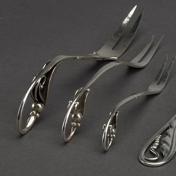 A Danish 20th century sterling 7 pcs serving kit, mark of G Jensen Copenhagen first half of the 20th century.