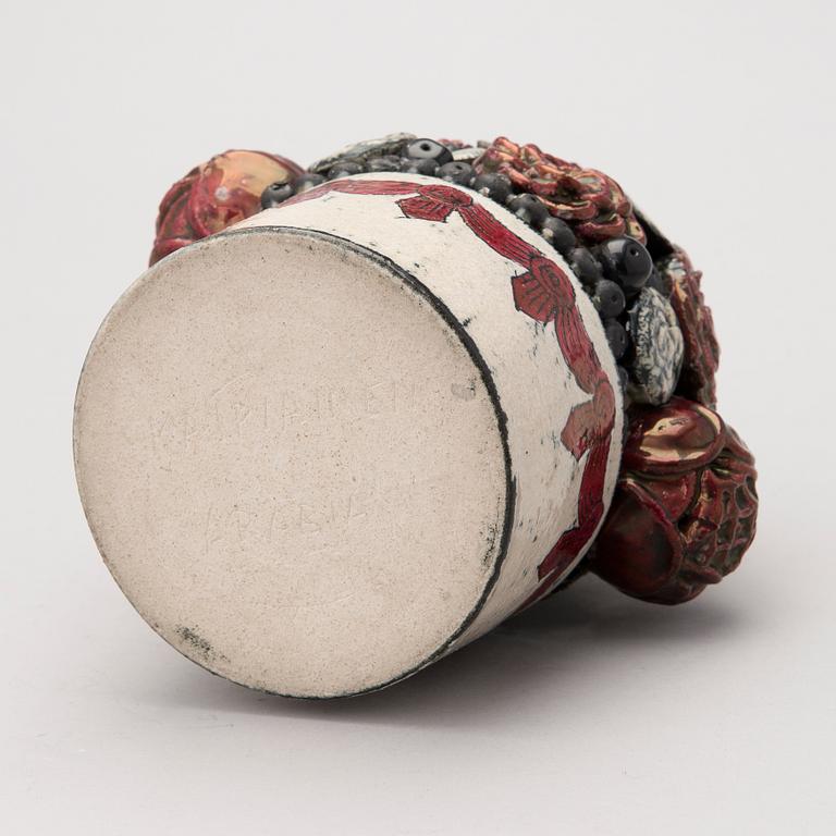 A stoneware sculpture, signed Kaipiainen Arabia.