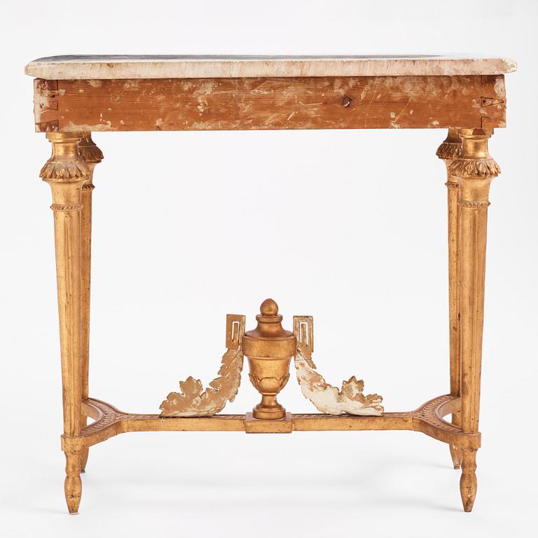 A Gustavian carved giltwood and marble console by O. C. Lindmark (master in Stockholm 1779-1813).