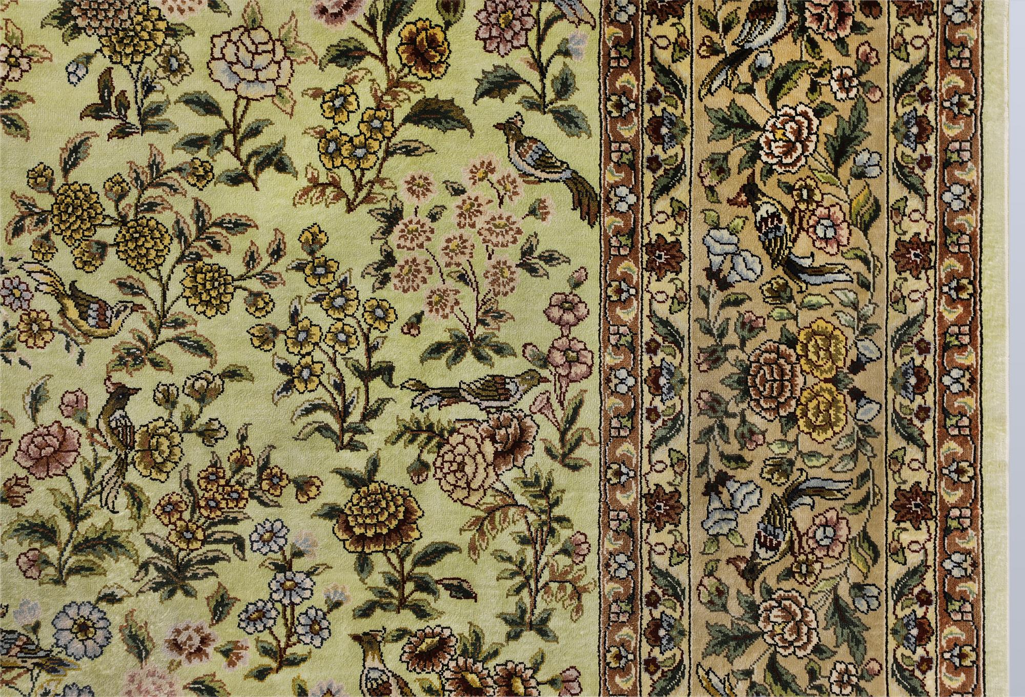 An Oriental silk rug, approx. 124 x 183 cm.