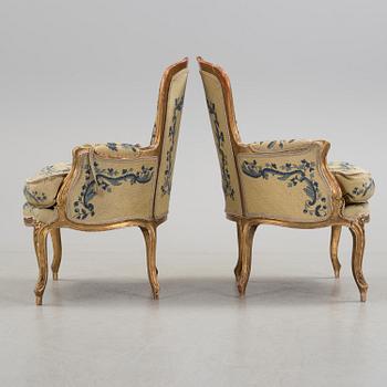 A Rococo 18th century bergere. One later, very similar, bergere included.