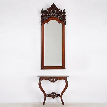 A walnut mirror and console table, second half of the 19th Century.