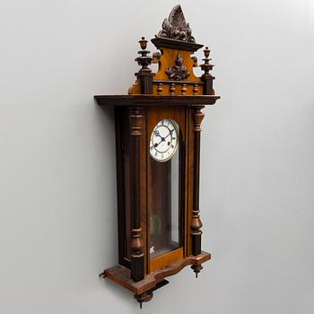 A neo renaissance German Junghans wall clock from around the turn of the 20th Century.