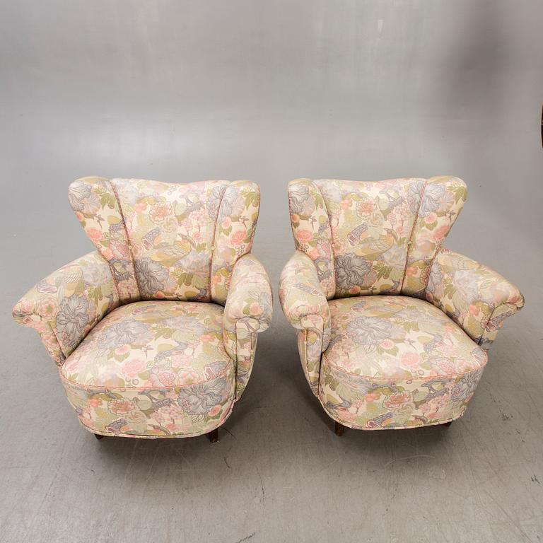 A pair of 1940s easy chairs.