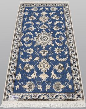 Two part silk Nain rugs, ca 136 x 70 resp 138 x 70 cm.