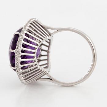 RING, 18K white gold with a large amethyst and small diamonds ca 0.65 cts.