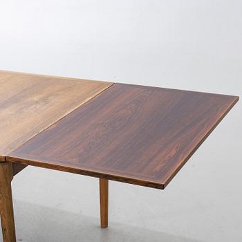 A Table from Slagelse Möbelvaerk A/S and 4 chairs, Niels Otto Møller, JL Møller. Denmark, 1960's.