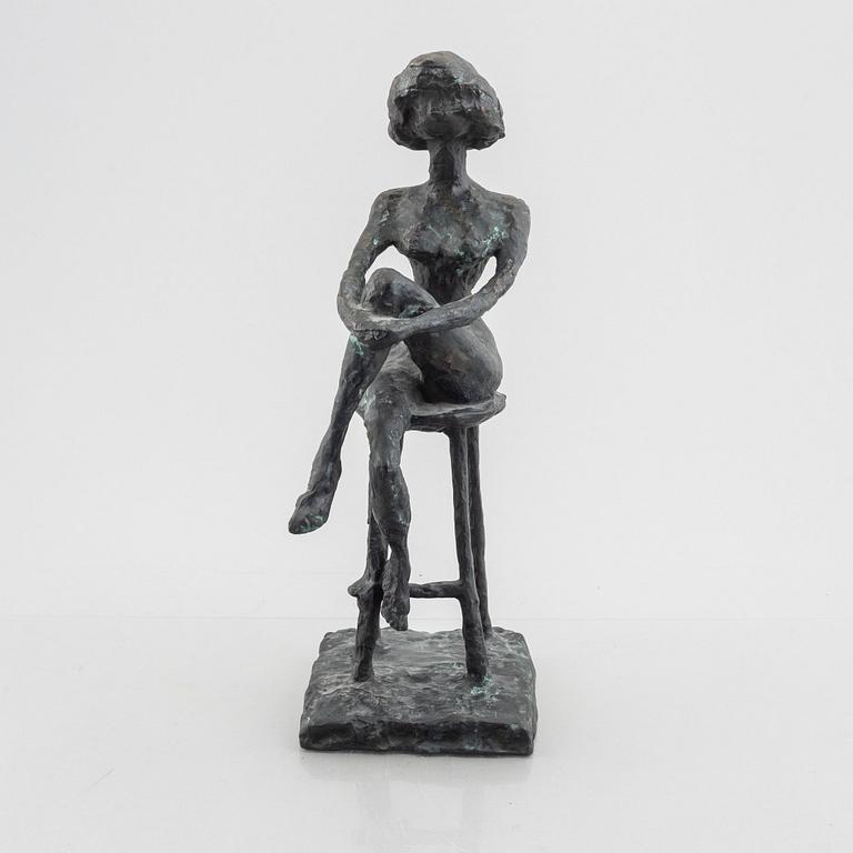 Inga Bagge, A seated woman.