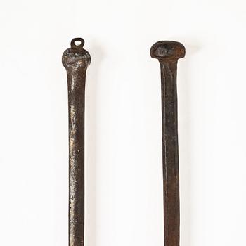 A set of two wrought iron fire pokers, 18th / 19th centiry.