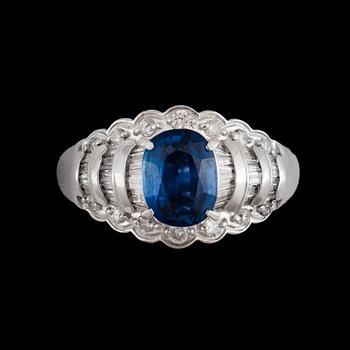 A untreated sapphire, 2.11 cts, and diamond, 0.75 cts in total, ring.