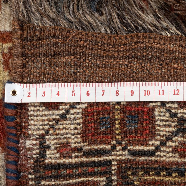 An antique Qashqai rug, southeastern Iran, c. 242 x 170 cm.