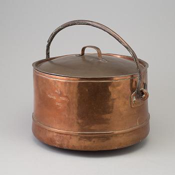 A 18th century copper cauldron.