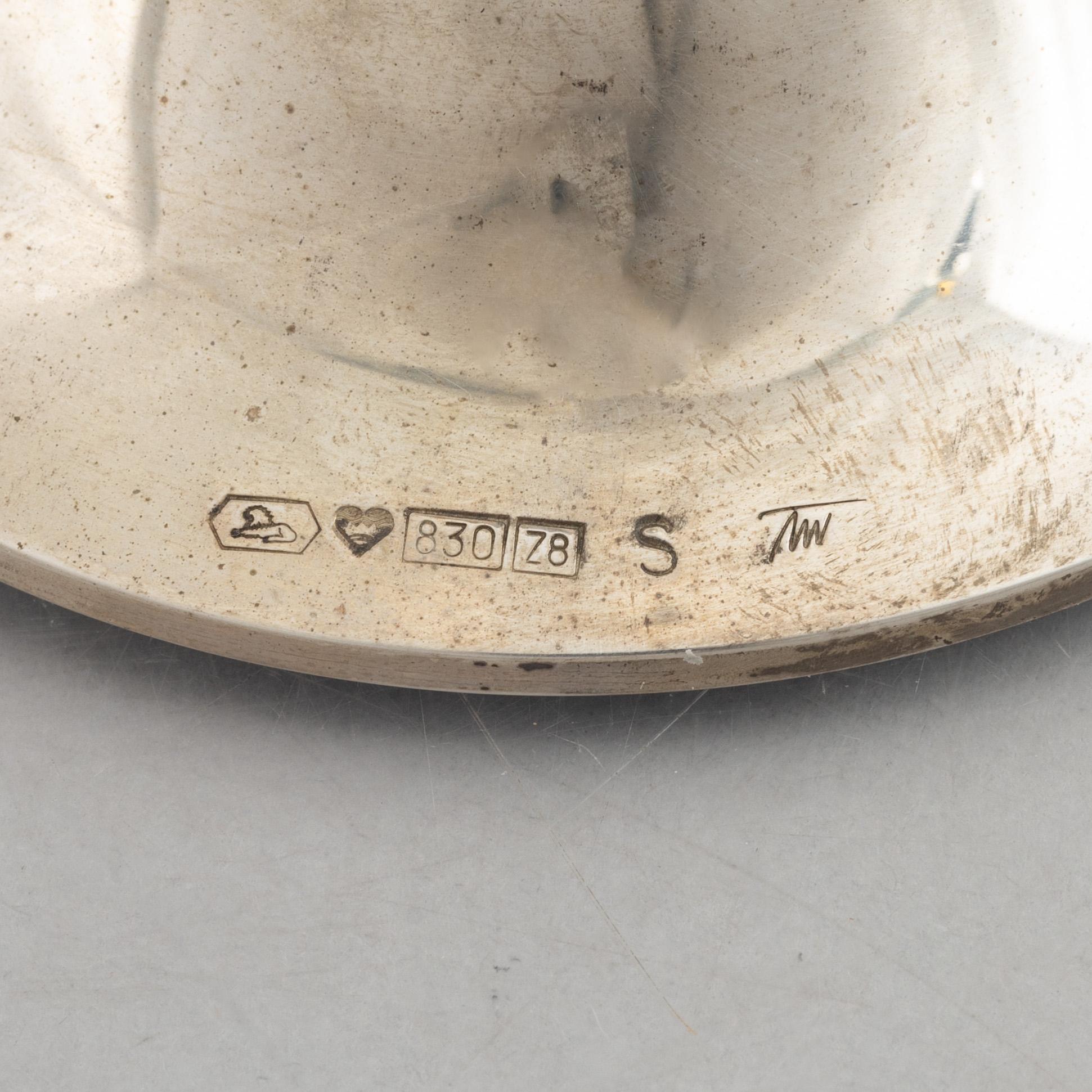 Two silver candlesticks, marks of Tapio Wirkkala, "Trumpetti", Kultakeskus, Tavastehus, Finland 2001.