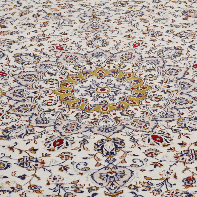 A Keshan rug, 400 x 295 cm.