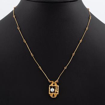 Lapponia, 14K gold necklace with a cultured pearl, designed by Björn Weckström "Magical Pearl".