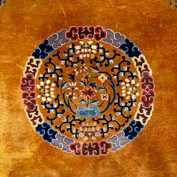 A semiantique Chinese carpet ca 394x302 cm.