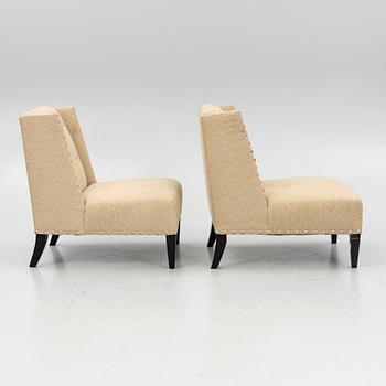 A pair of 'Triton custom chair' lounge chairs, Andrew & Martin, England, 21st century.