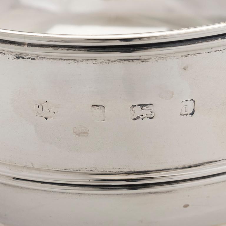 A set of two bowls with handles, sterling silver, England.