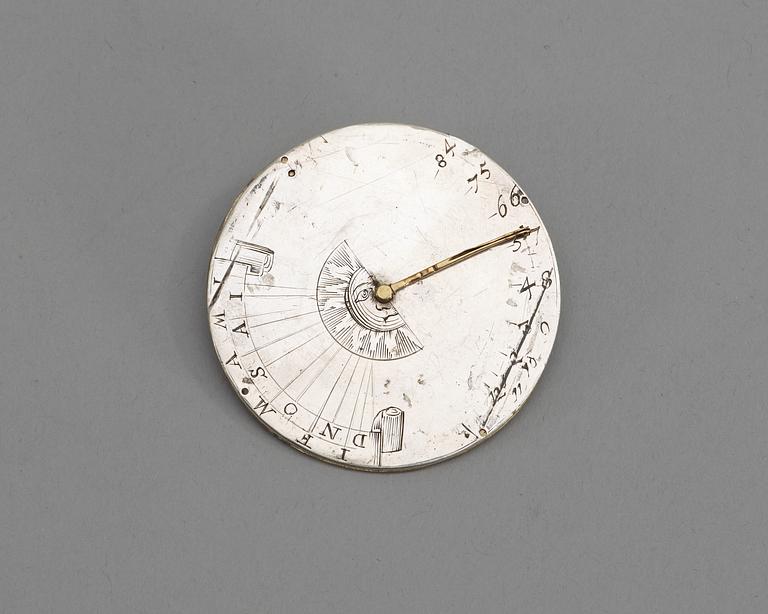 An 18th century silver and brass astrological calender, unmarked.