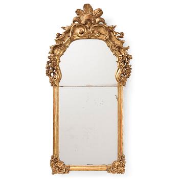 89. A presumably German giltwood rococo mirror, mid 18th century.