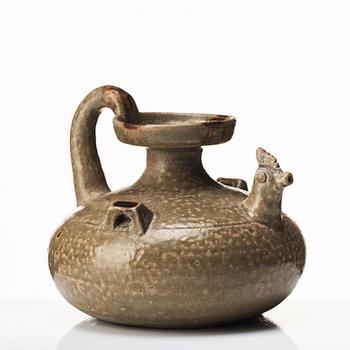 A olive green glazed wine jar, probably Jin/Six dynasties (265-420).