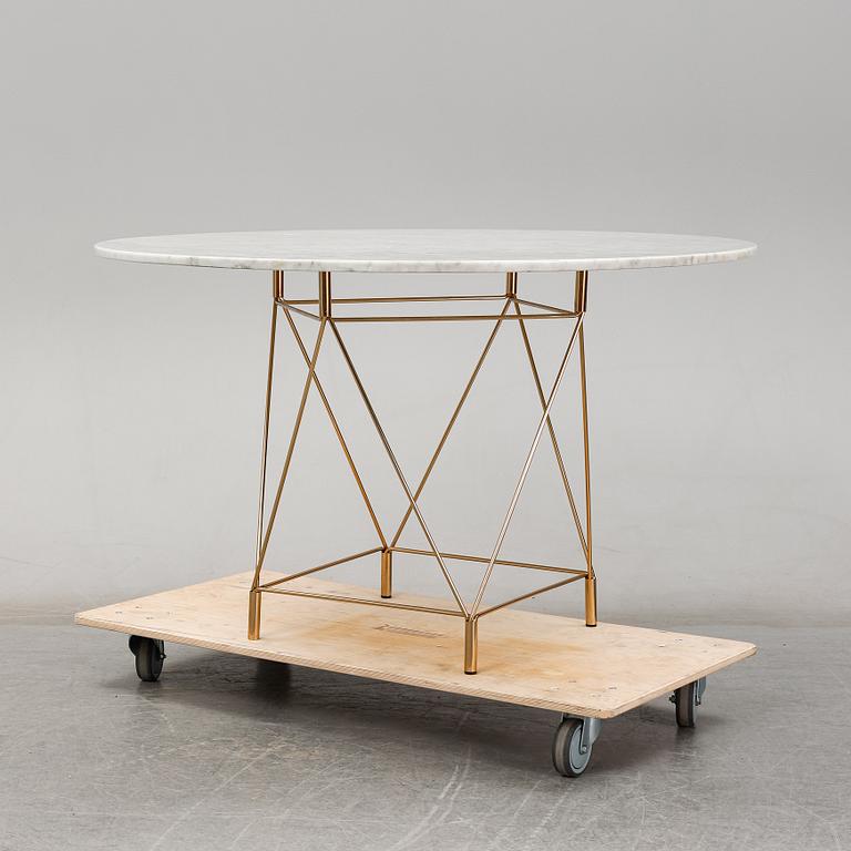 A 'Spider' dining table by Andreas Hansen for Eilersen.