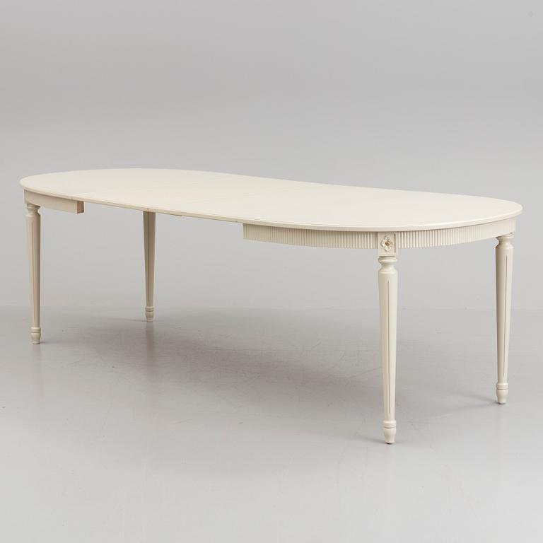 A 20th century Swedish Gustavian style dining table.