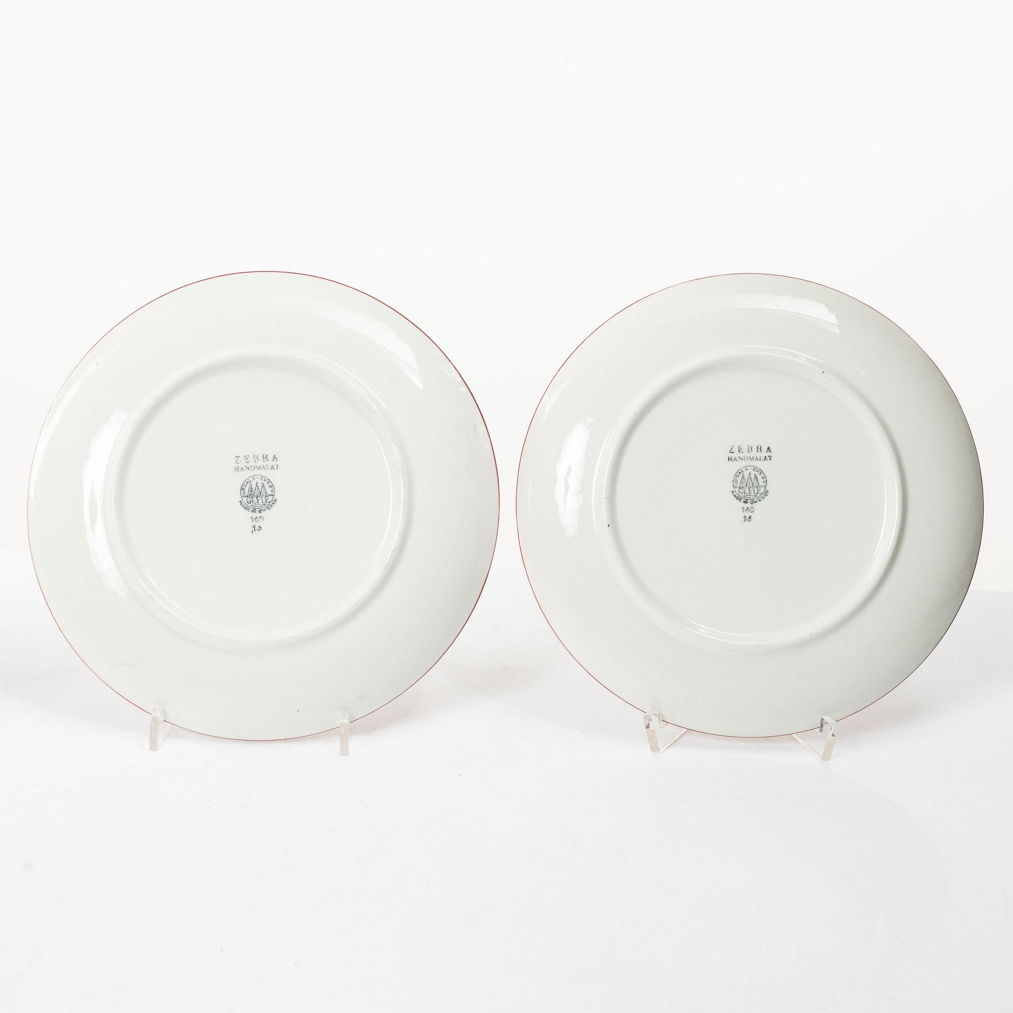 Eugen Trost, Five 'Red Zebra' cream-ware side plates. Uppsala-Ekeby Gefle.