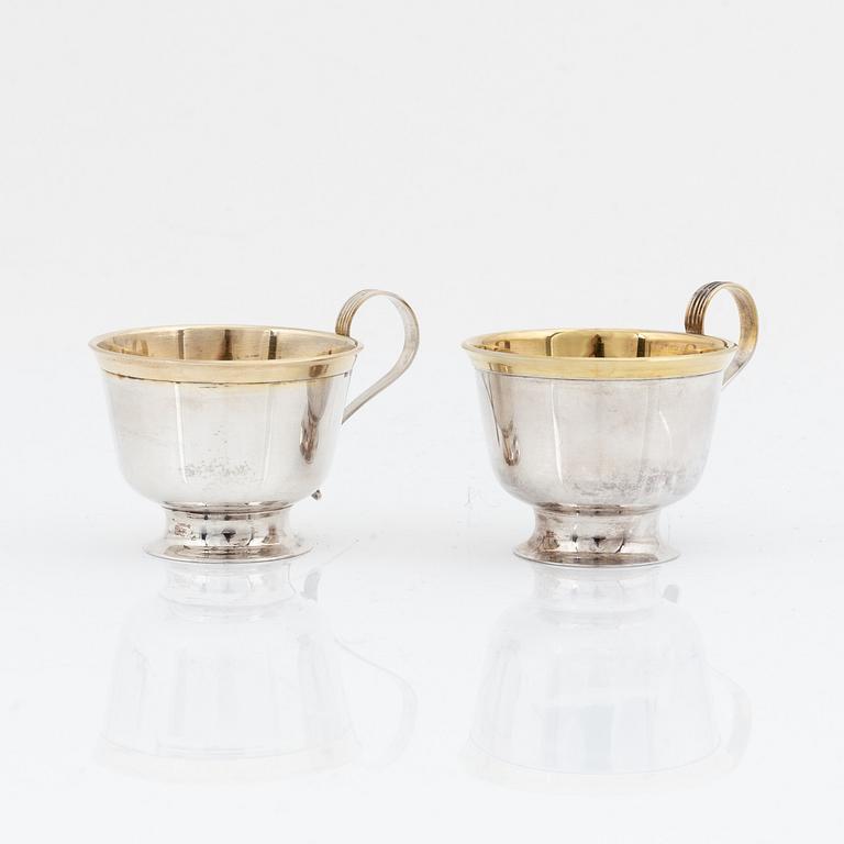 Twelve parcel gilt silver mugs, Johanna Gottschalk, Arkala, Stockholm, 1962-68.