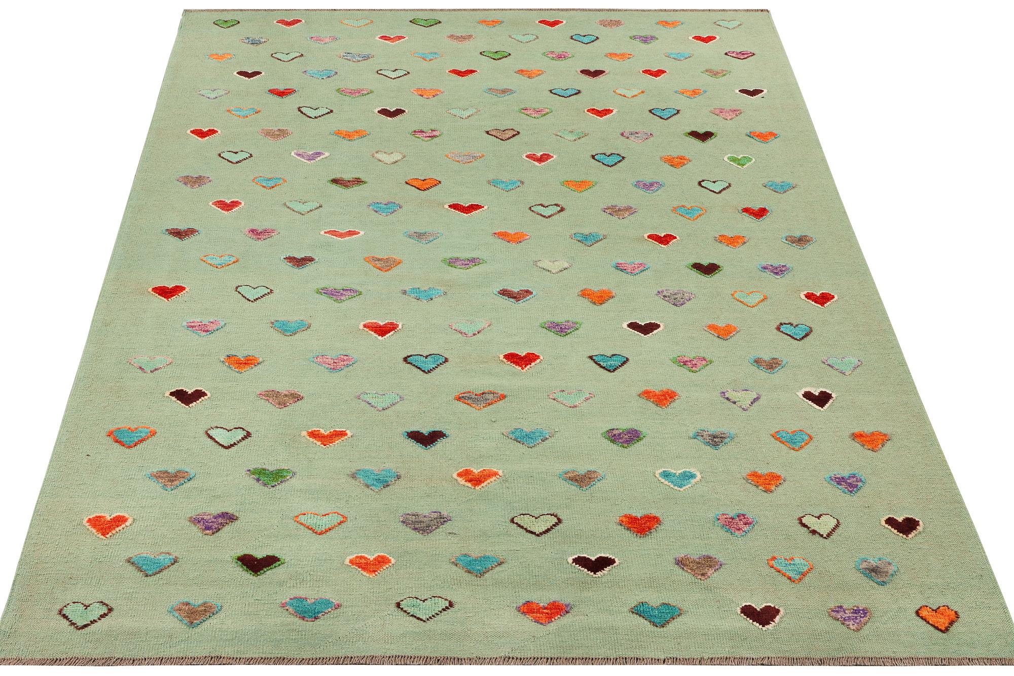 An Afghan kelim carpet, c. 295 x 204 cm.