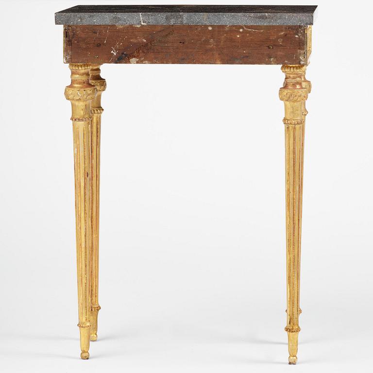 A late Gustavian carved giltwood and marble console table attributed to P. Ljung (1743-1819).