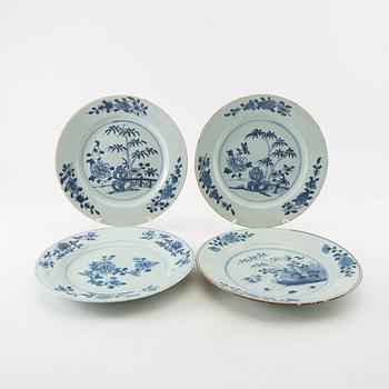 A matched set of four blue and white dinner plates, Qing dynasty, Qianlong (1736-95).