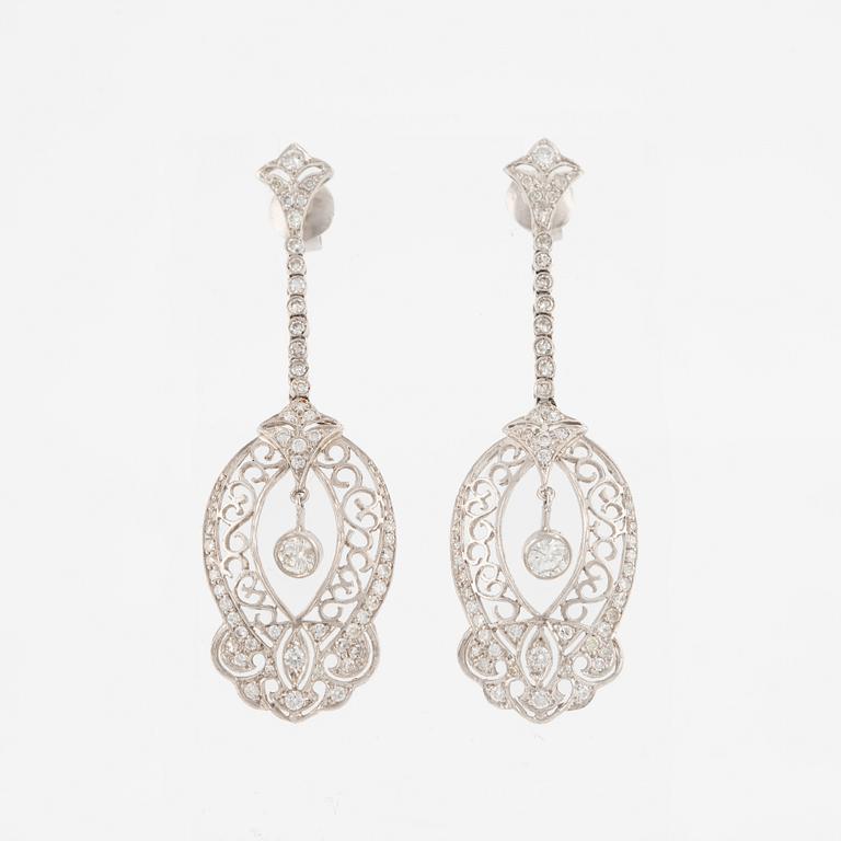 Platinum earrings with brilliant-cut and octagon-cut diamonds.