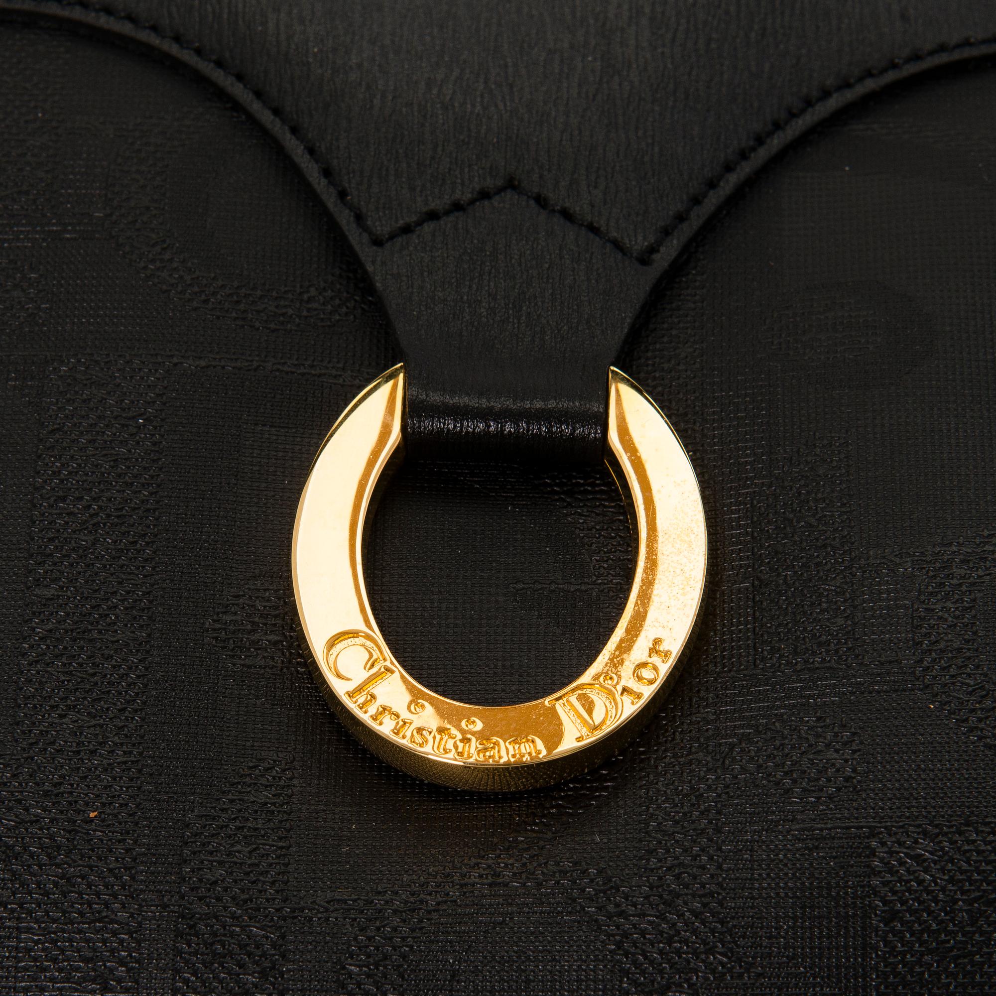 CHRISTIAN DIOR Black Monogram Coated Canvas Duffel Bag.