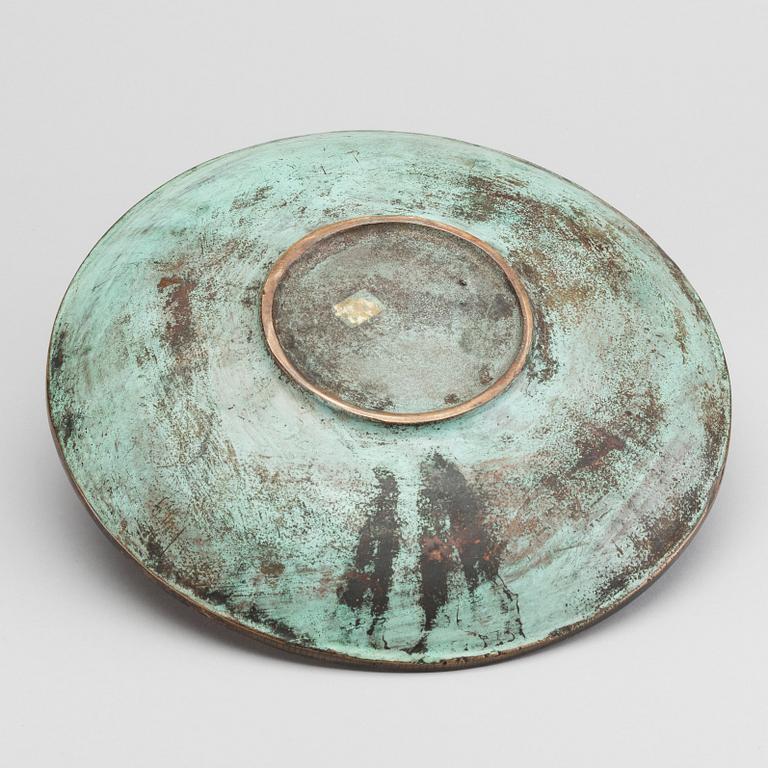 A GUNNAR NYLUND BRONZE PLATE.