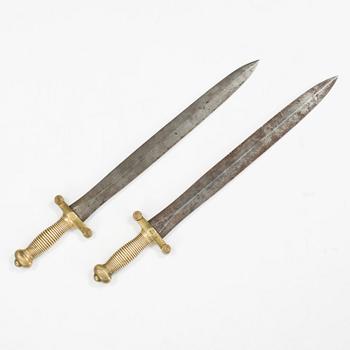A pair of French military daggers from the first half of the 19th century.