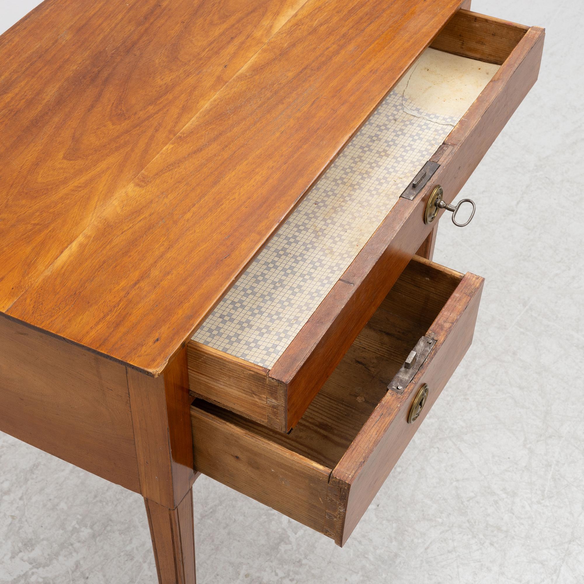 A side table with drawers, first half of the 19th century.