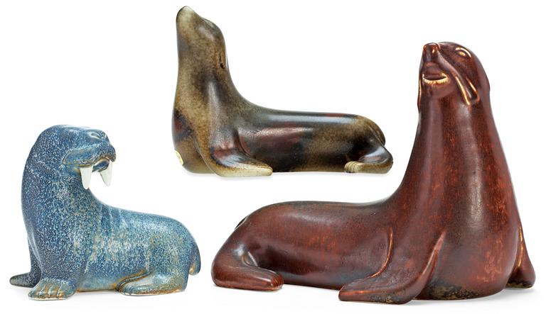 Three Gunnar Nylund stoneware figures, two seals and a walrus, Rörstrand.