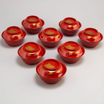 Eight lacquered bowls with covers, Japan, 20th century.