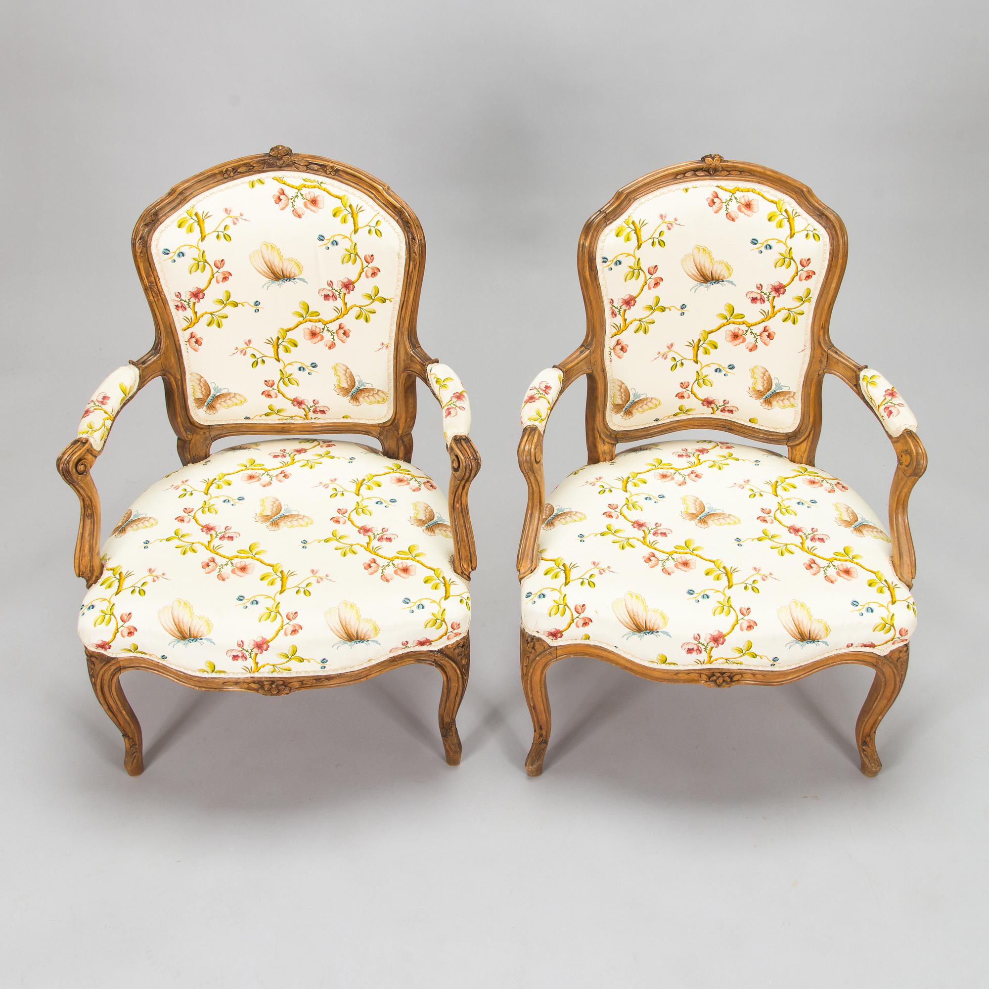 Two French, mid-18th-century Louis XV open armchairs.