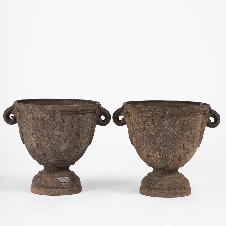 A pair of Swedish baroque cast-iron urns, circa 1700.
