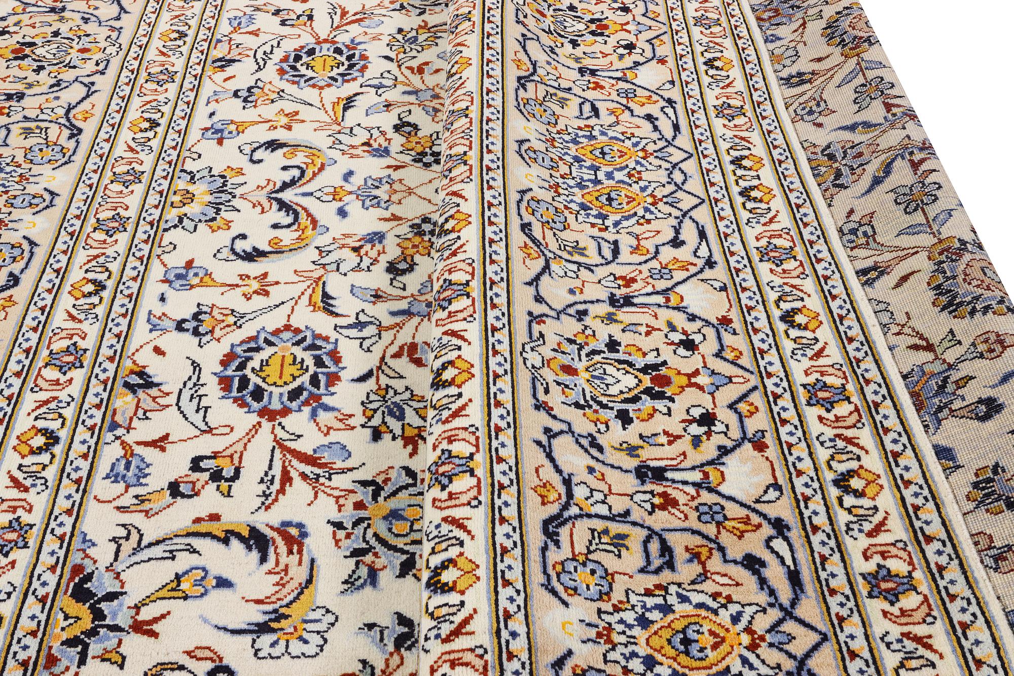 A Kashan carpet, c. 380 x 271 cm.