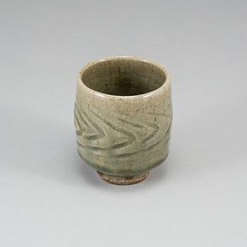 TATSUZŌ SHIMAOKA, a celadon glaze vase, signed.