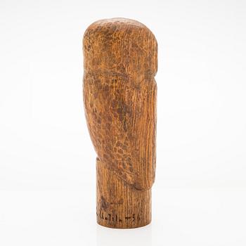 Gunnar Uotila, a wooden sculpture signed -56-.