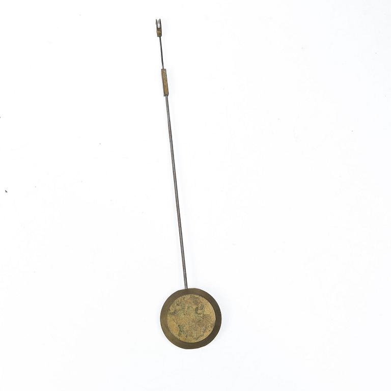 A French Charles X ormolu and patinated bronze mantel clock, ca 1820's.